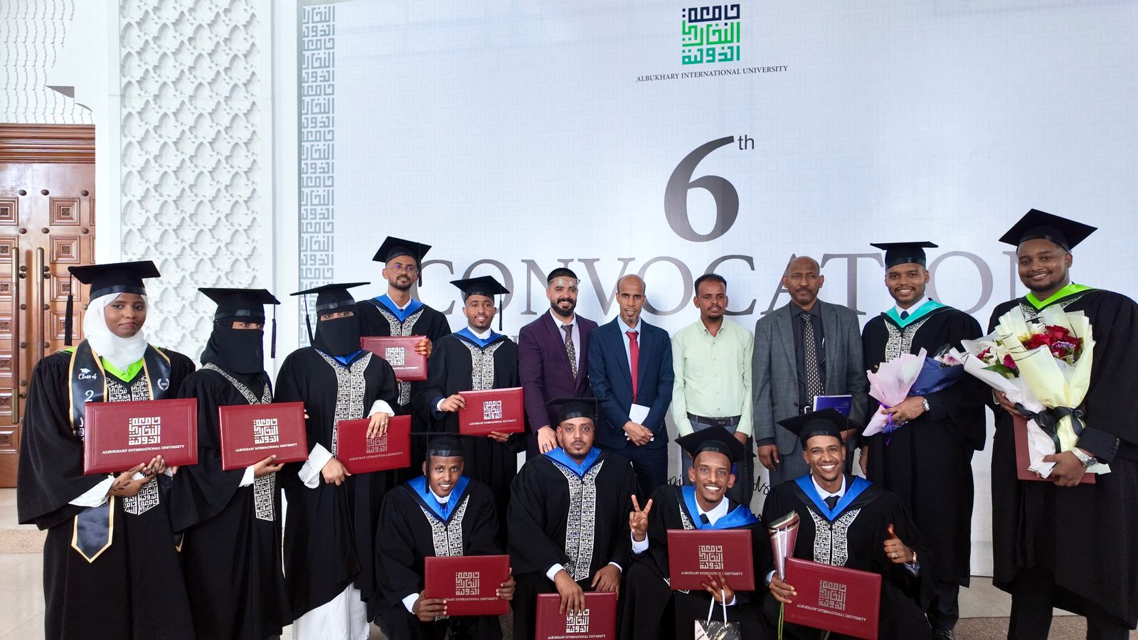Students celebrating graduation at an education event